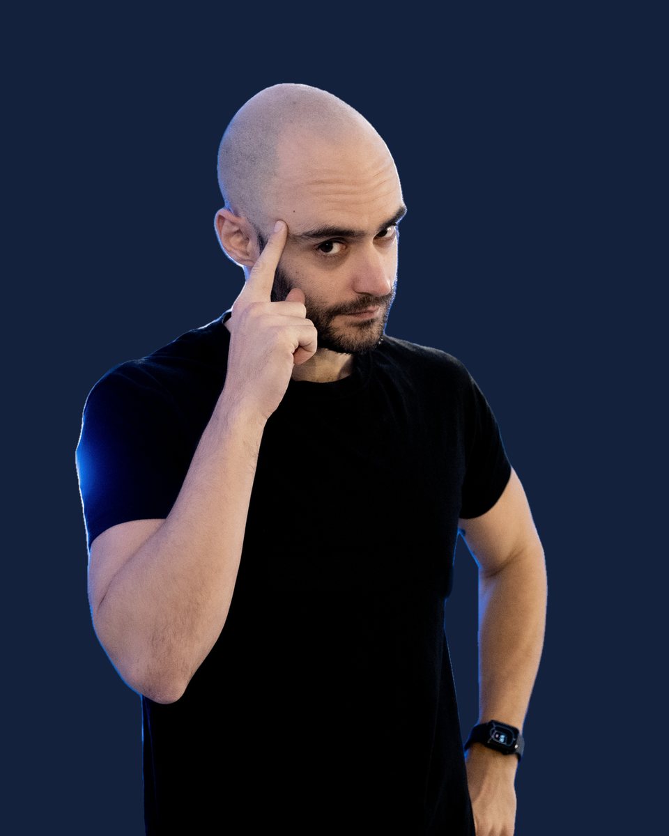 George Mouratidis, finger to temple