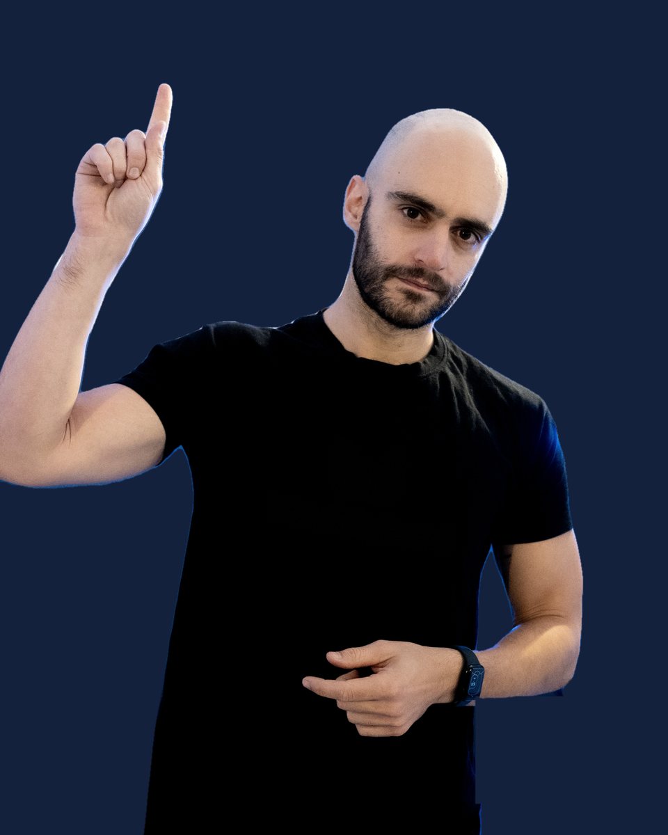 George Mouratidis raising one finger